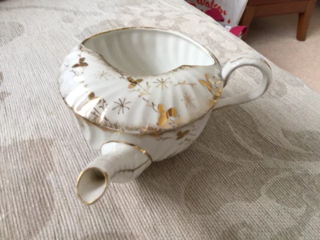White with gold pattern china invalid feeding cup, 100+ years old