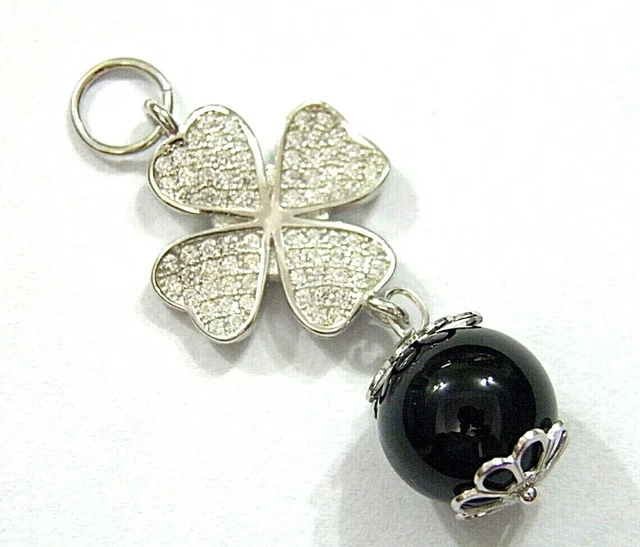 Ciondolo amuleto Su Coccu in argento con inserti di corallo – Regalando