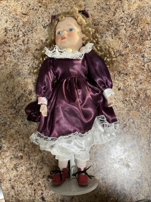 nameless porcelain doll purple dress white rose blonde hair blue eyes