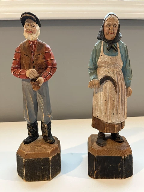 Antique pair of Andre Bourgault hand carved wood sculptures couple