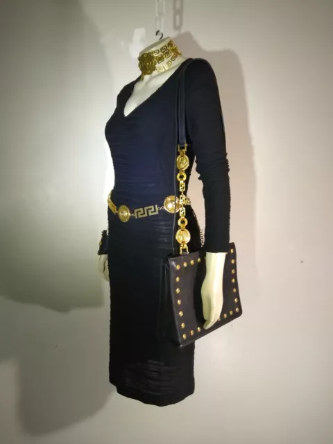 VERSUS by GIANNI VERSACE Size,  body concious little black dress firs 38/42