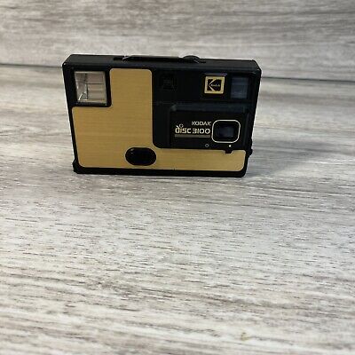 Cámara Kodak Disc 3100 dorada y negra vintage década de 1980 con 1 pieza/reparación de disco usada