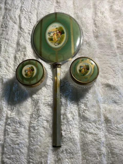 Beautiful hand mirror and two glass jars . Age Unknown