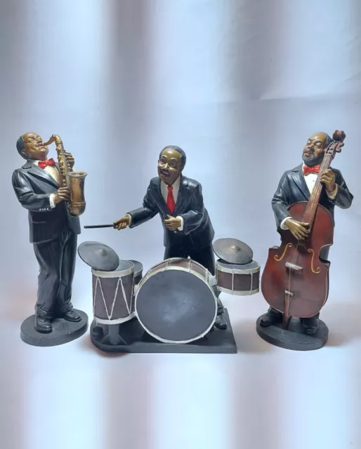 3 statuettes musiciens jazz blues   saxophone batterie violoncelle   H 31.5 cm