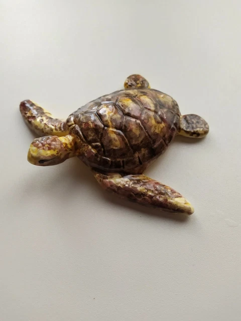 système d’accroche des tortue de mer en céramique artisanat français