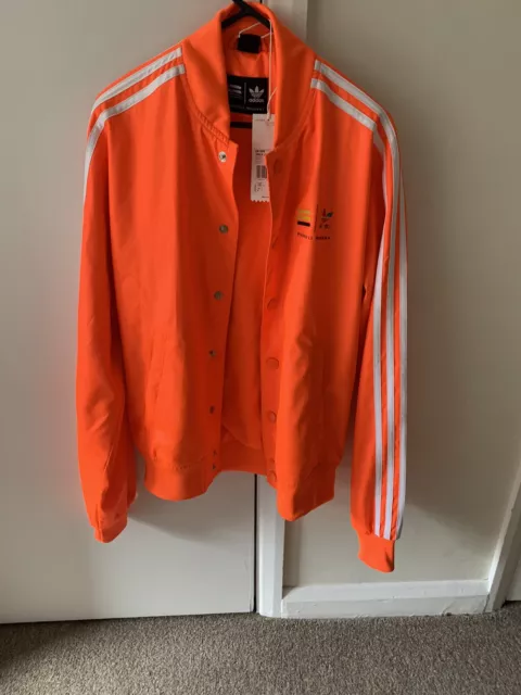 BNWT 2014 ADIDAS Originals x Pharrell Williams Orange Track Top