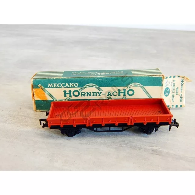 718 - Un Wagon Hornby Plat A Essieux Ridelles Basses En Boite - Ho