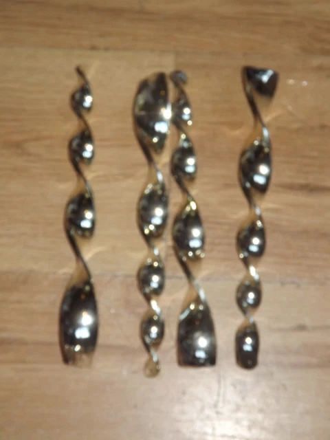 Cuatro decoraciones colgantes libres de oro brillante de 25 cm