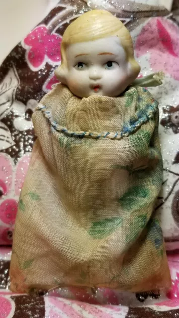 Antique vintage bisque? porcelain? mini baby doll with hand painted arms jointed