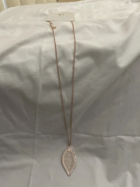 Charming Charlie  Rose Gold Necklace With Rose Gold And Rhinestone Feather Charm