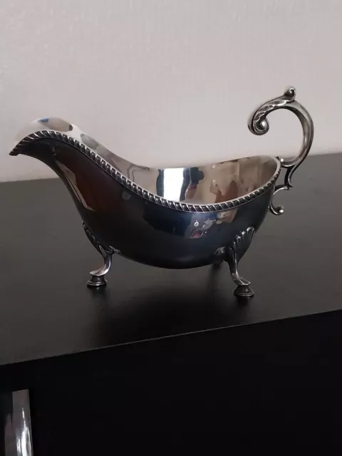 Silver Plated Gravy Boat With Scroll Handle And Shell Feet