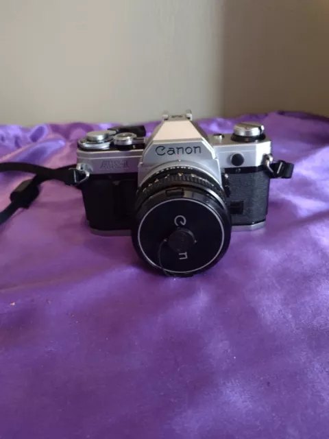 Canon AE-1 35mm SLR Film Camera with Canon 50mm f/1.8 FD Lens - WORKS GREAT