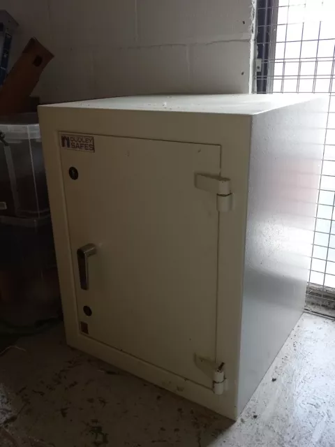 Dudley Safe. With two key locks. Good weight. Measurements 2ftx2ftx30"