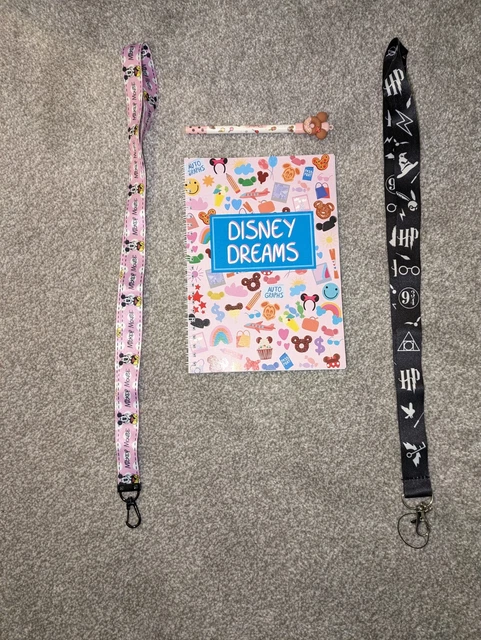 Disney trip planning book, pen and lanyards