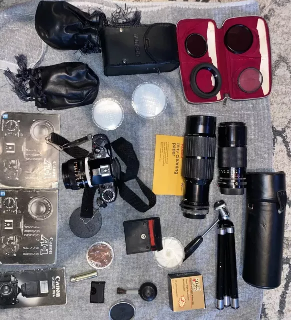 Canon A-1 35mm SLR Film Camera Bundle Accessories W/WinderManual/Lenses & More!