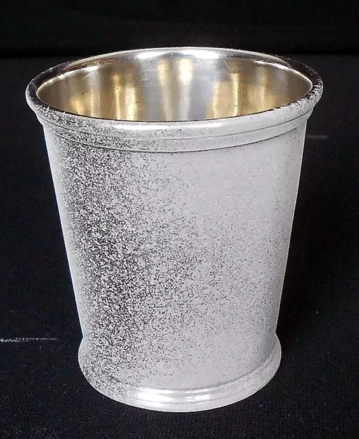 A solid silver beaker retailed by William Kendrick, Louisville, KE, c.1850-60.