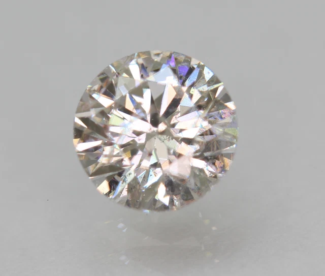 Certified 0.56 Carat H SI1 Round Brilliant Enhanced Natural Loose Diamond 5.27mm