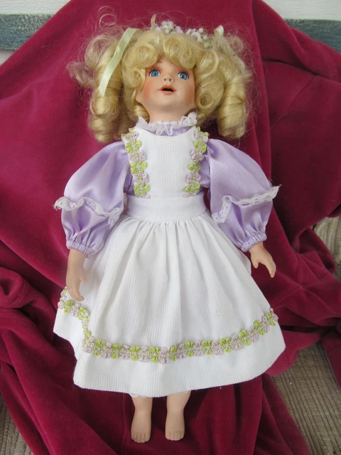 Bisque Porcelain Doll with Cloth Body 14 inch tall