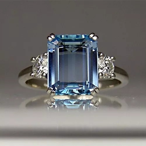 2.50 Ct Sky Blue Topaz and Diamond Emerald Cut Ring in 14k White Gold All Size 7