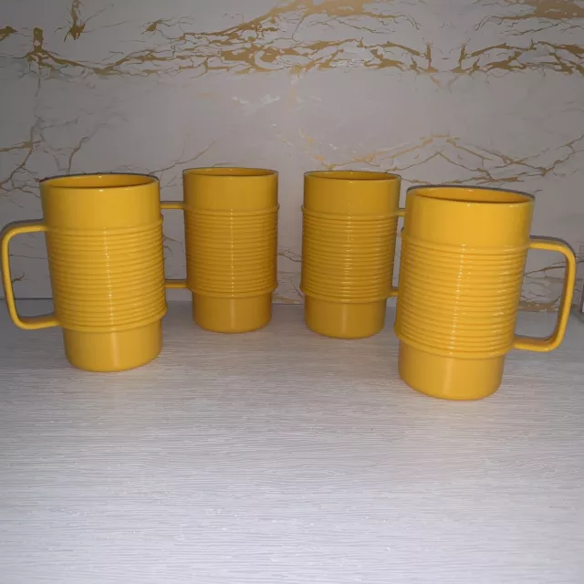 https://www.picclickimg.com/PIAAAOSwhX5ikSO-/Lot-of-4-VTG-Rubbermaid-Yellow-Plastic-Ribbed.webp