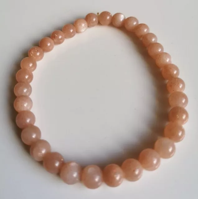 Bracelet de Perle en Pierre de Soleil - Extensible (diamètre env 6 cm)