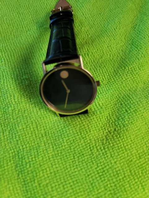 Movado Solid 14kt Gold case  Black Museum Dial Watch 36 0750 172