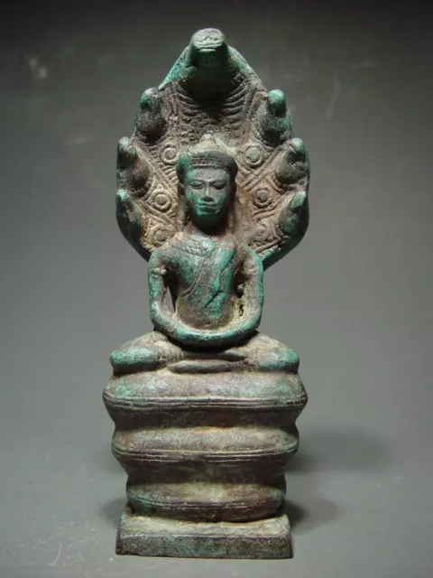 ANTIQUE KHMER BRONZE NAGA PROTECTED BUDDHA, ANGKOR WAT 'BAYON' STYLE. 17/18th C.