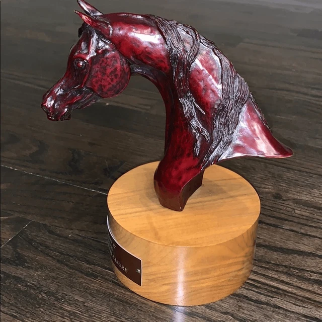 Bust of a Bay Arabian horse on pine base. Price is per piece