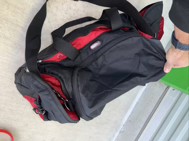 Tumi Black Nylon Duffel Bag 20x 10x 12"  Red And Black