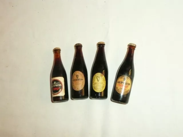 Collection of 4 Different Miniature Guinness Bottles. Empty.