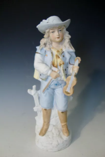 Figurine en porcelaine bisque marquée Unger & Carl Schneider « garçon avec violon » 8 1/2"H