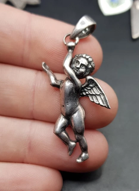Guardian angel necklace argos hotsell