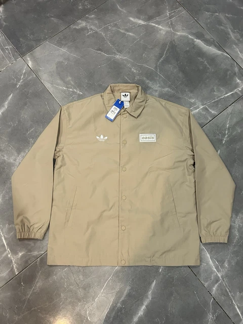 スケートボード adidas x Oasis Tour Coach Jacket \"Stone Pre Order Adidas x Oasis Tour Coach Jacket 'Stone Khaki' - HZ0878