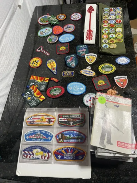 LOT of Boy Scout Memorabilia. Merit Badges, Sash, Books, Council Patches, Etc…