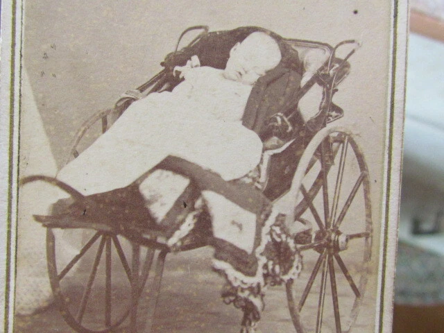 1860's sleeping or post mortem child in huge buggy in New Orleans cdv photo