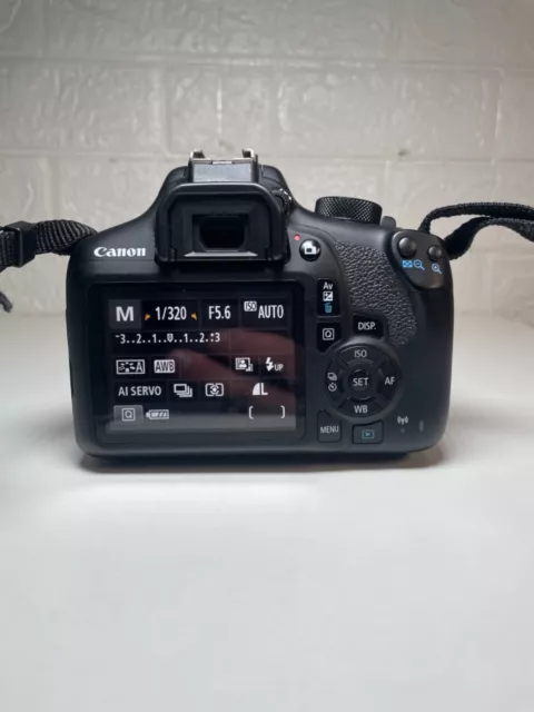 Fotocamera reflex digitale Canon EOS 1300D e kit obiettivi Canon EF-S 18-55 mm II batteria e caricabatterie 2