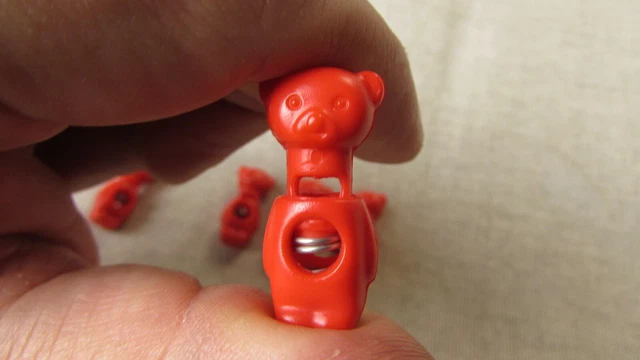 5 palancas rojas de oso de peluche