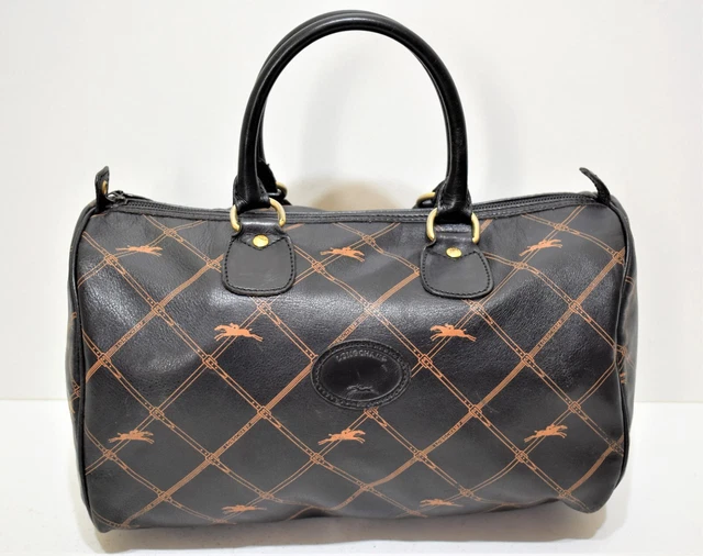 Longchamp, Sac porté main forme bowling, en cuir noir monogrammé, vintage