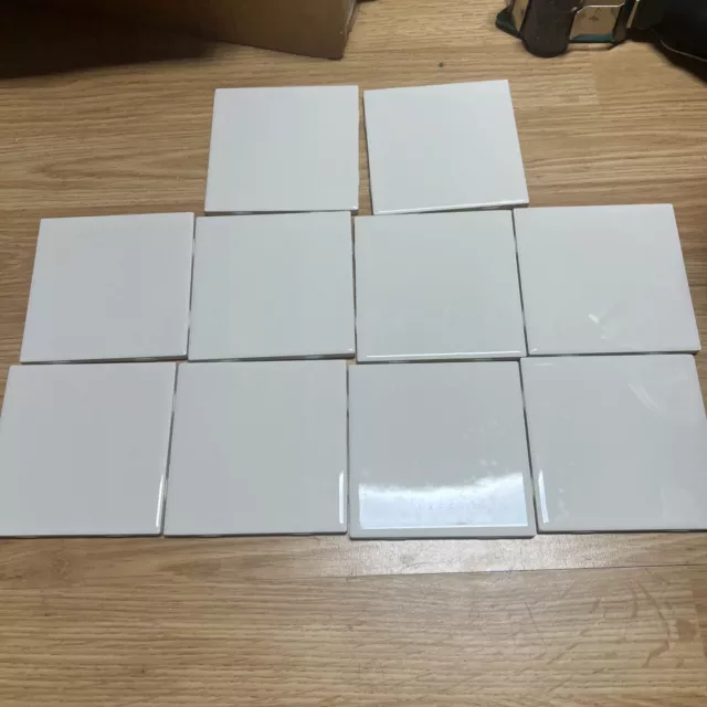 Ten 4.25  in American Olean Biscuit white colored ceramic subway tiles