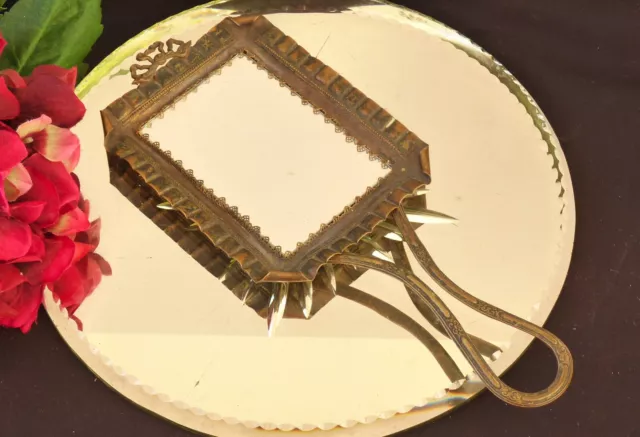 Hand mirror French ? Brass frame Antique