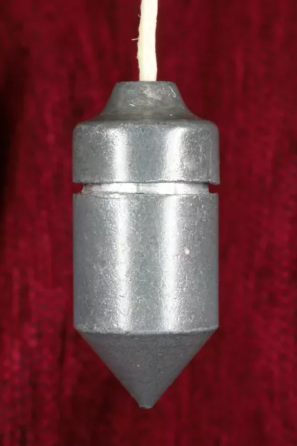 Plomada perico cabeza presionada. S.XX. Plumb bob perico pressed head.