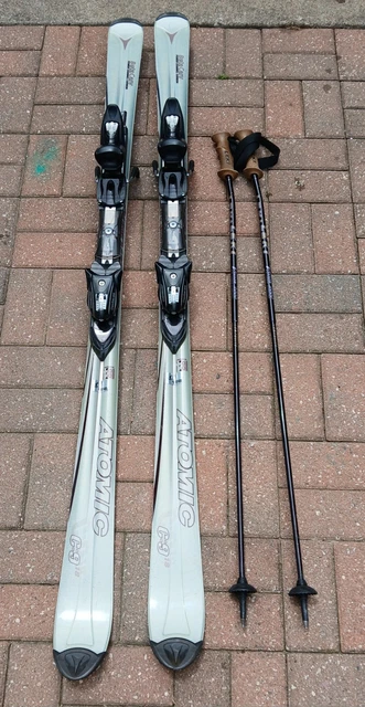 150 ATOMIC BETA CARV C9 SKIS AND SKI Poles +carrier Bag