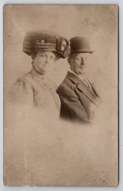 RPPC Older Couple Portrait Woman Large Fancy Hat Man Derby Hat Postcard G22