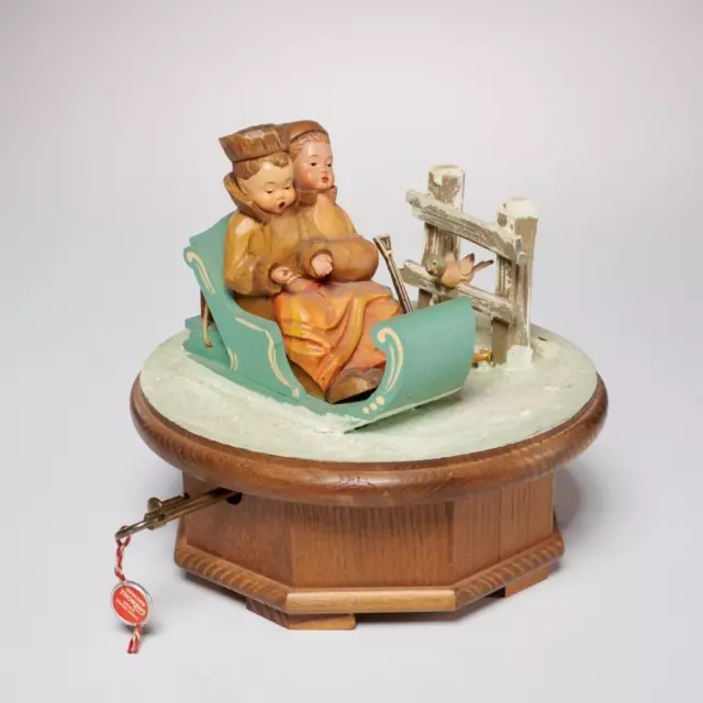 Anri Thorens Winter Children on Snow Sled Wind Up Rotating Music Box 6.5" dia
