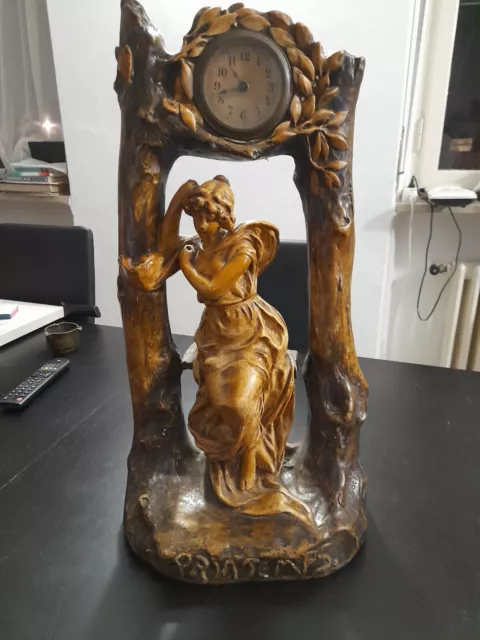 orologio da tavolo con scultura h.59 cm