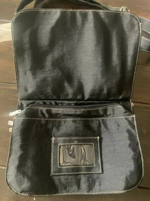Black Nylon Baggallini Pocket Travel Crossbody Bag Purse. Tan Interior. Zip Clos