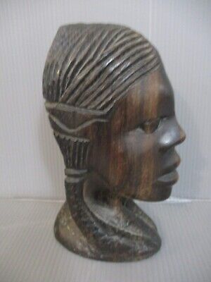 African art: tribal art, a wooden carved sculpture of young woman, Africa,60's 2