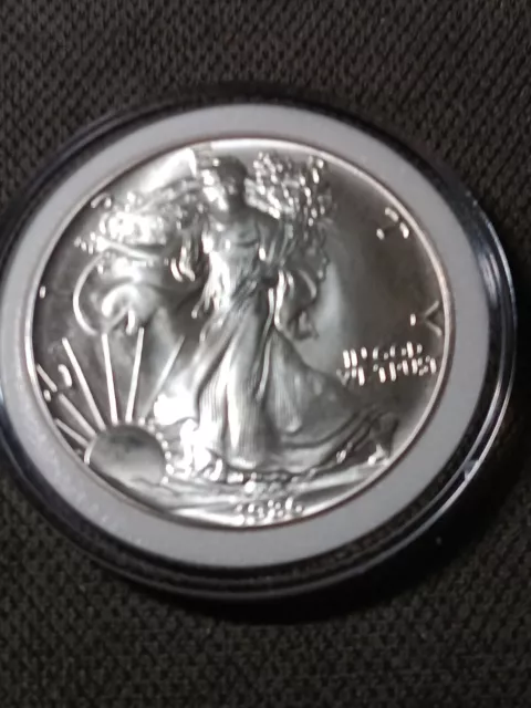 👉1986 (1) American Silver Eagle BU UNC FROM ROLL First Year -in capsule