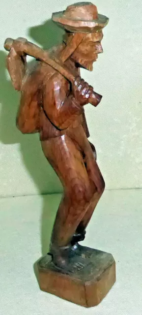 Hand Carved Small Wooden Statue of a Man with an Axe and Bag