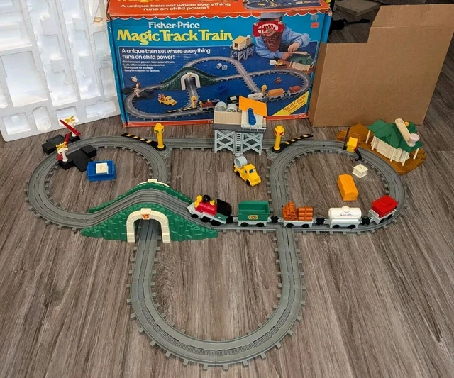 Fisher price magic track train sales